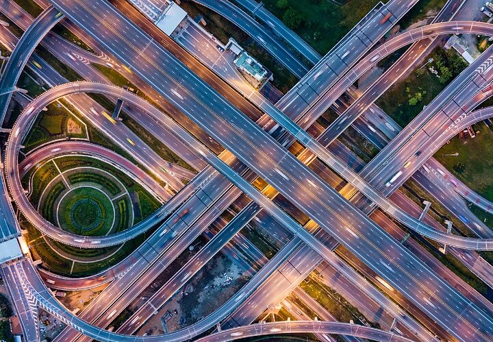 Aerial view of complex highway interchange illustrating advanced journey management and traffic flow optimisation.