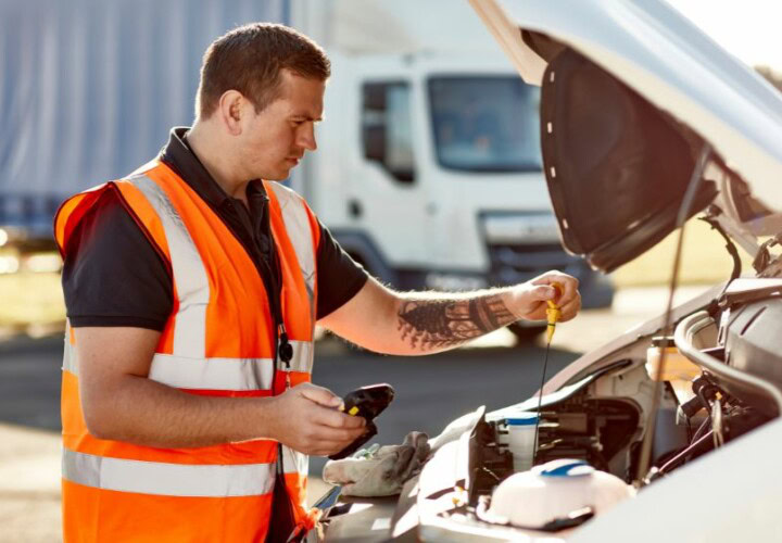 engineer doing vehicle health checks