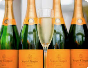 Champagne bottles with a glass of sparkling wine, celebrating achievement or special occasion, representing luxury and festive moments.