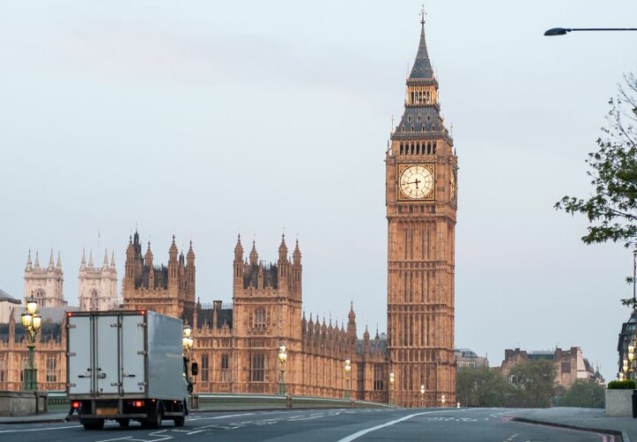 lorry driving on empty london road