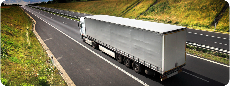 white lorry on a road