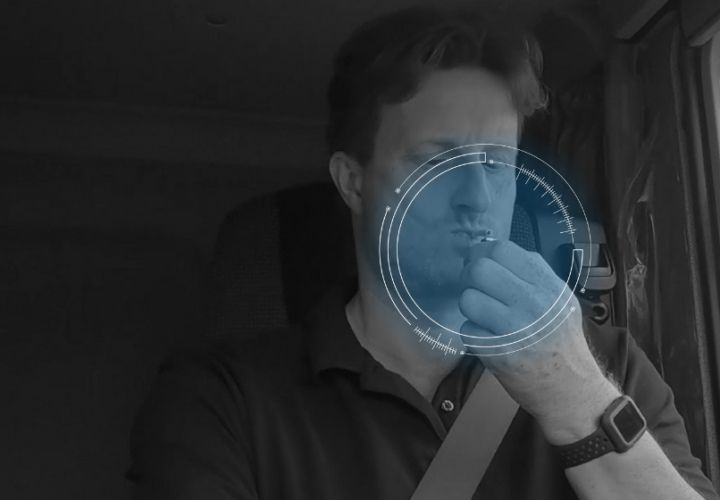 driver lighting cigarette