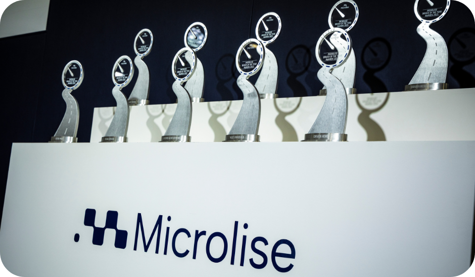 Collection of Microlise Driver of the Year awards trophies displayed at the 2026 shortlist announcement event.