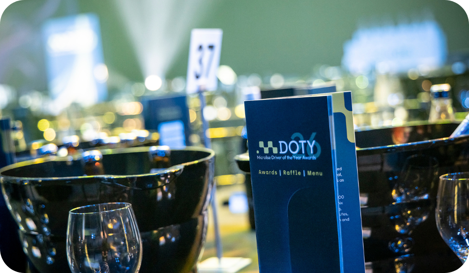 Microlise event setup with awards and dining tables, showcasing technology and hospitality environment for logistics and transport industry professionals.